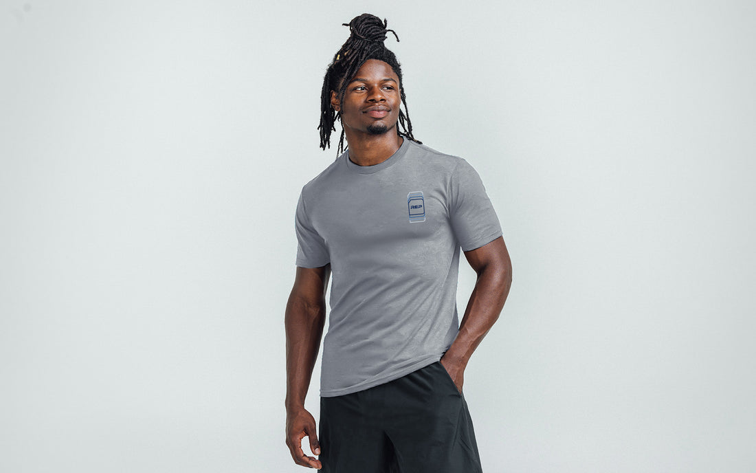 The REP Fitness Repetition Tri-Blend Crew T-Shirt in Heather Flint/Blue on body
