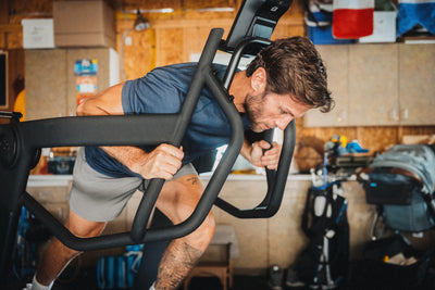 Athlete pushing in sled mode on the Strive Curved Treadmill
