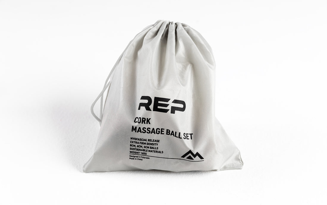 Studio-shot: REP Cork Massage Ball Set drawstring carrying bag closed with the balls inside.
