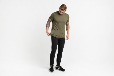 The REP Fitness Men's Felix Pants 2.0 in Black front, adjusting outfit