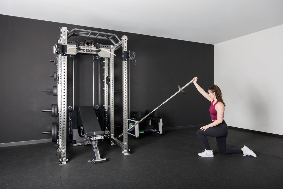 An athlete using the Kleva Adroit attached to the PR-5000 rack for a shoulder workout