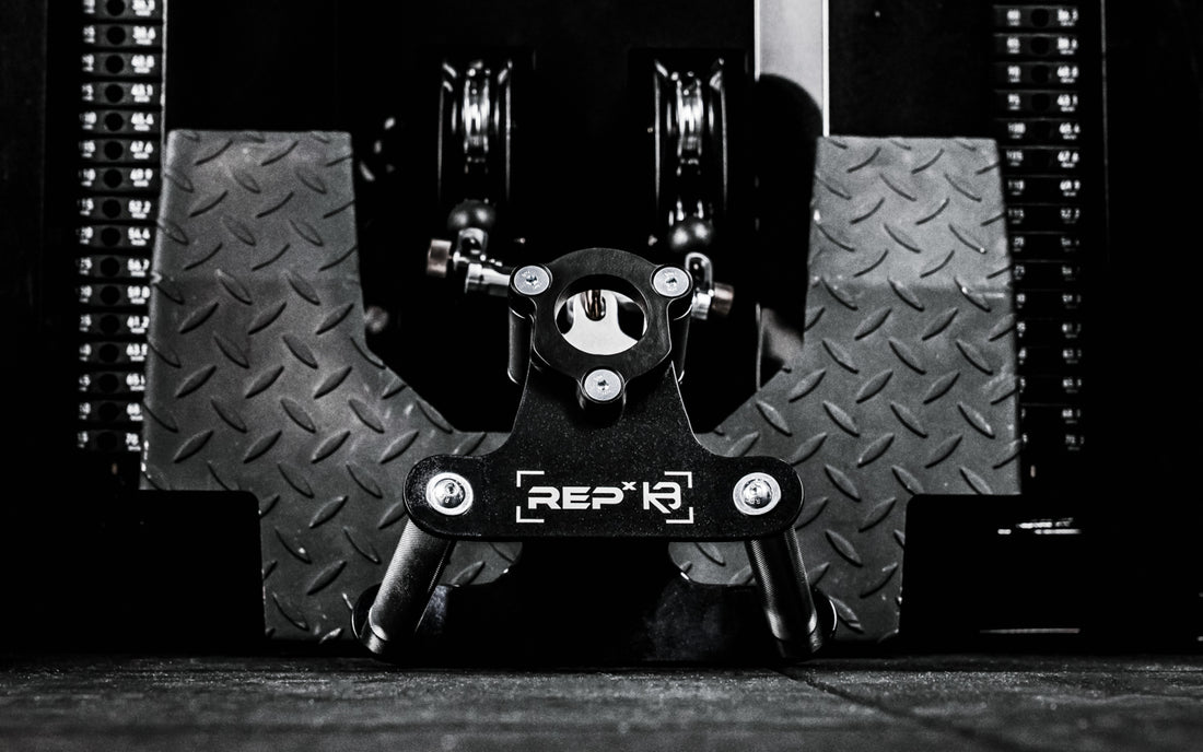REP® x Kleva Built® Angled Atlas™ Close-Grip Cable and Landmine Attachment on the low row cable on an Ares™ 2.0