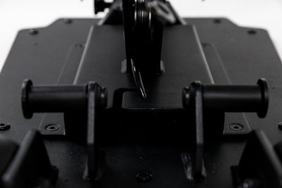 Close-up shot of the band pegs and cable housing on the Leg Extension & Leg Curl Bench Attachment