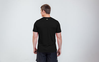 The REP Fitness Men's Daily Driver 2.0 USA Tri-Blend Crew T-Shirt in Heather Black/White back, on model