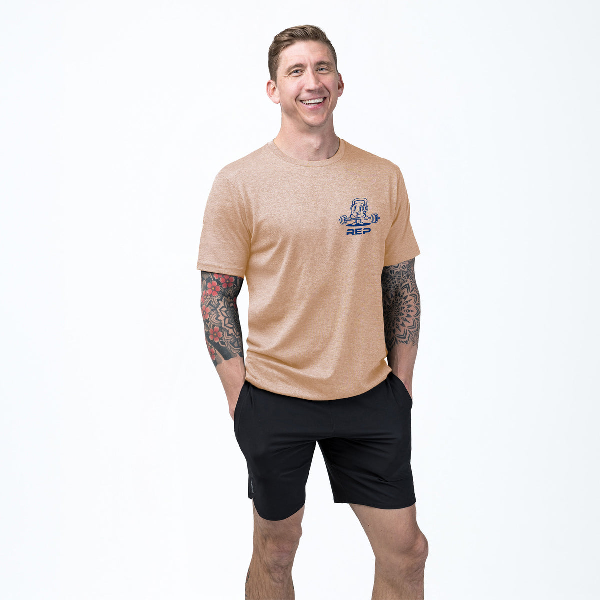 The REP Fitness Deadlift Party Tri-Blend Crew T-Shirt in Heather Peach/Blue front