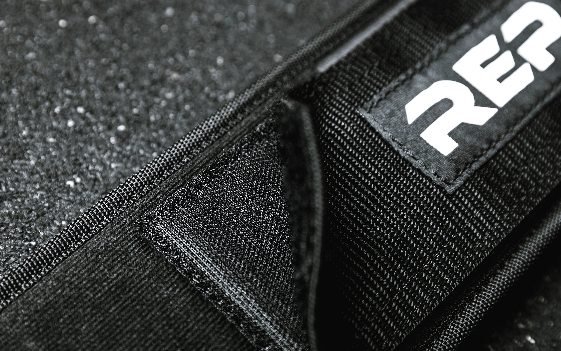 Close-up view of the hook-and-loop fastener on the REP Nylon Lifting Belt.