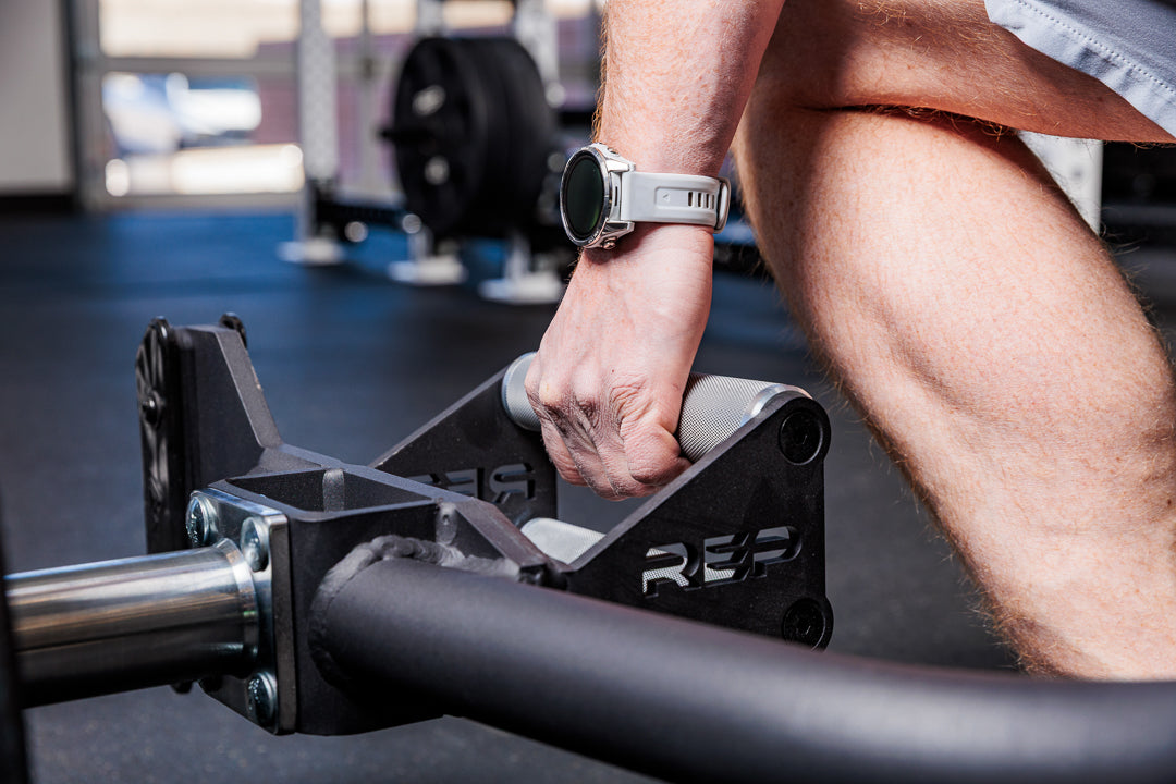 Close-up of Fixed Open Trap Bar hybrid handles with REP logo