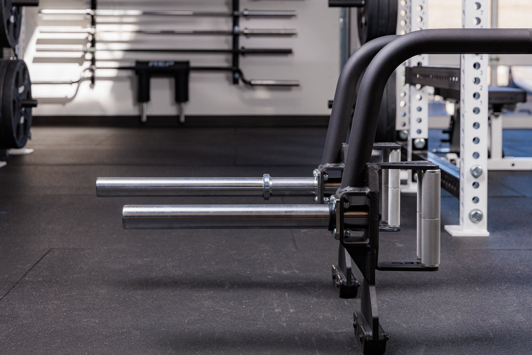 Close up of the two different barbell sleeve options (Rackable or compact) for the Fixed Open Trap Bar and Showing the difference