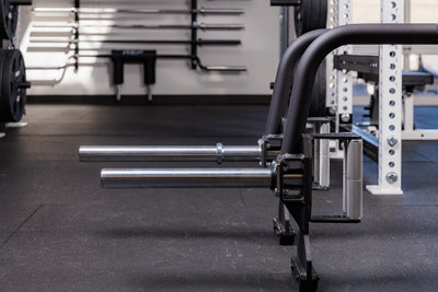 Close up of the two different barbell sleeve options (Rackable or compact) for the Fixed Open Trap Bar and Showing the difference
