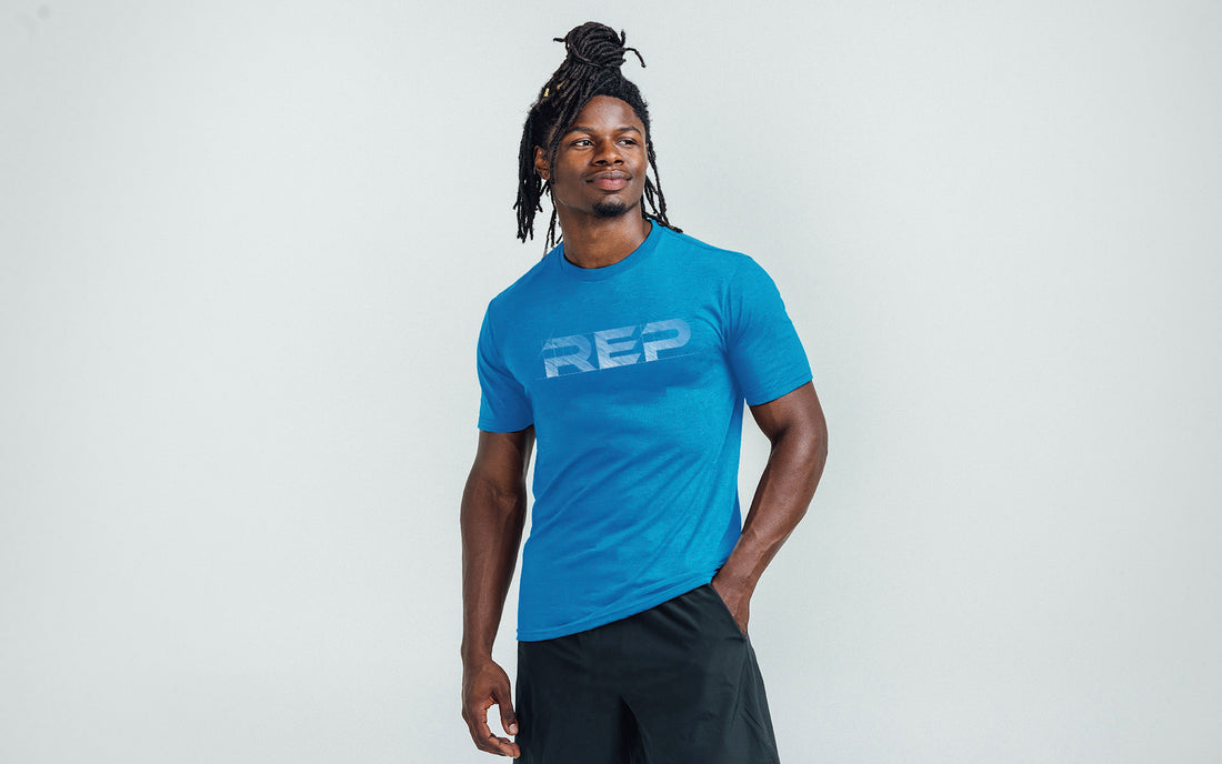 The REP Fitness Men's Blueprint Tri-Blend Crew T-shirt in Heather Royal/White front, alternate model