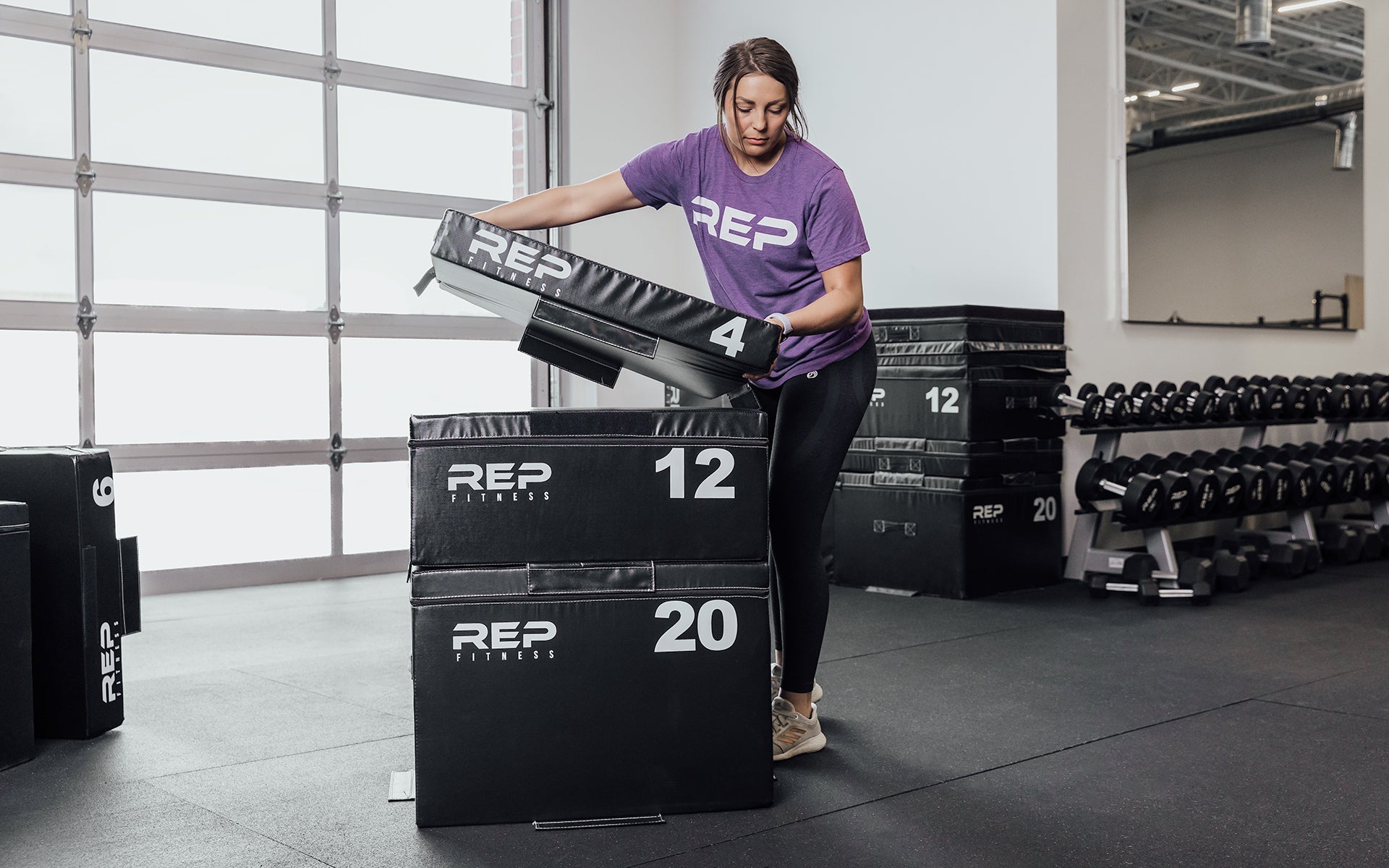 Female athlete adding the 4
