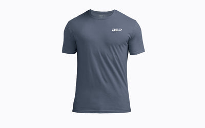 The REP Fitness Men's USA Tri-Blend Crew T-Shirt in Heather Navy/White front, flat lay