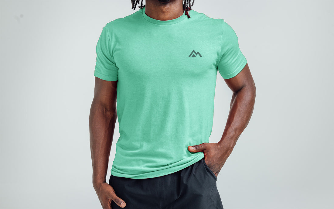 The REP Fitness Men's Peak Tri-Blend Crew T-Shirt in Heather Sage/Green on body