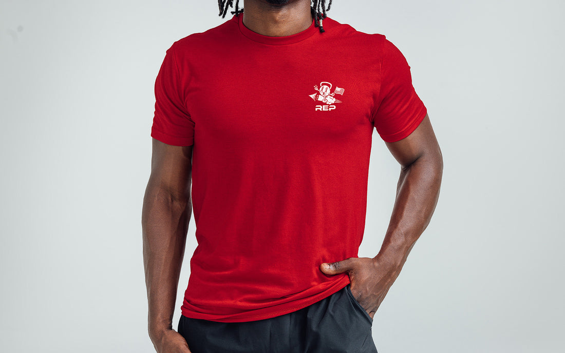 The REP Fitness Men's Liberty Bell Tri-Blend Crew T-Shirt in Heather Red/White front
