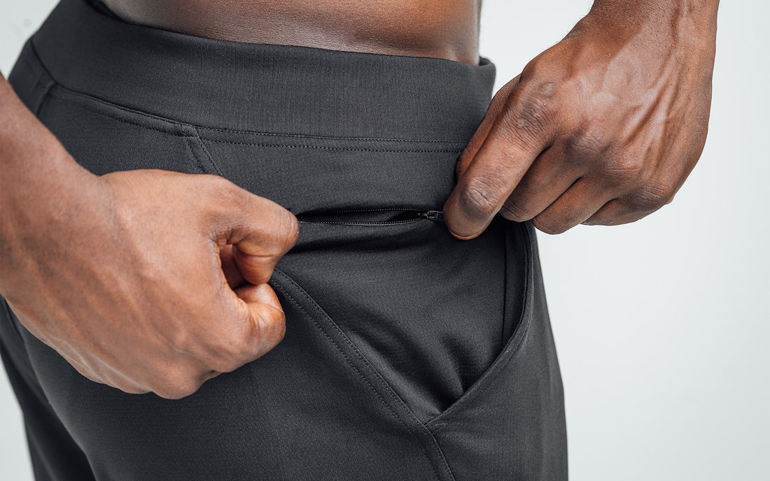 The REP Fitness Men's Attis Shorts in Heather Black on body, zipper detail