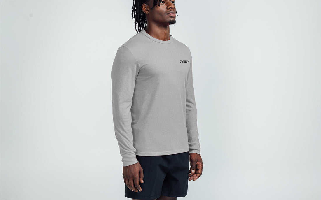 The REP Fitness Men's REP® Long-Sleeve Tri-Blend Crew T-Shirt in Heather Gray/Black on body