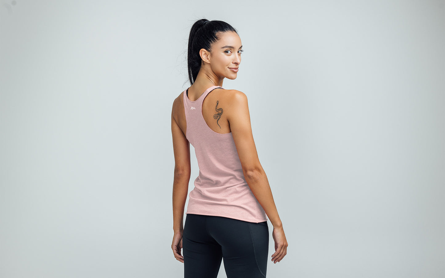 The REP Fitness Women's Daily Driver Tri-Blend Tank in Heather Rose/White back