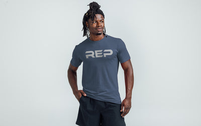 The REP Fitness Men's Daily Driver 2.0 Tri-Blend Crew T-Shirt in Heather Navy/Silver on body