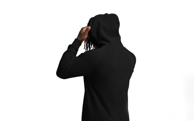 The REP Fitness Unisex Daily Driver 2.0 Pull Over Hoodie in Black/White back, reaching for hood