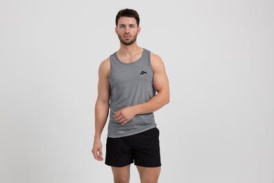 The REP Fitness Men's Peak Tri-Blend Tank in Heather Aluminum/Black front, on model