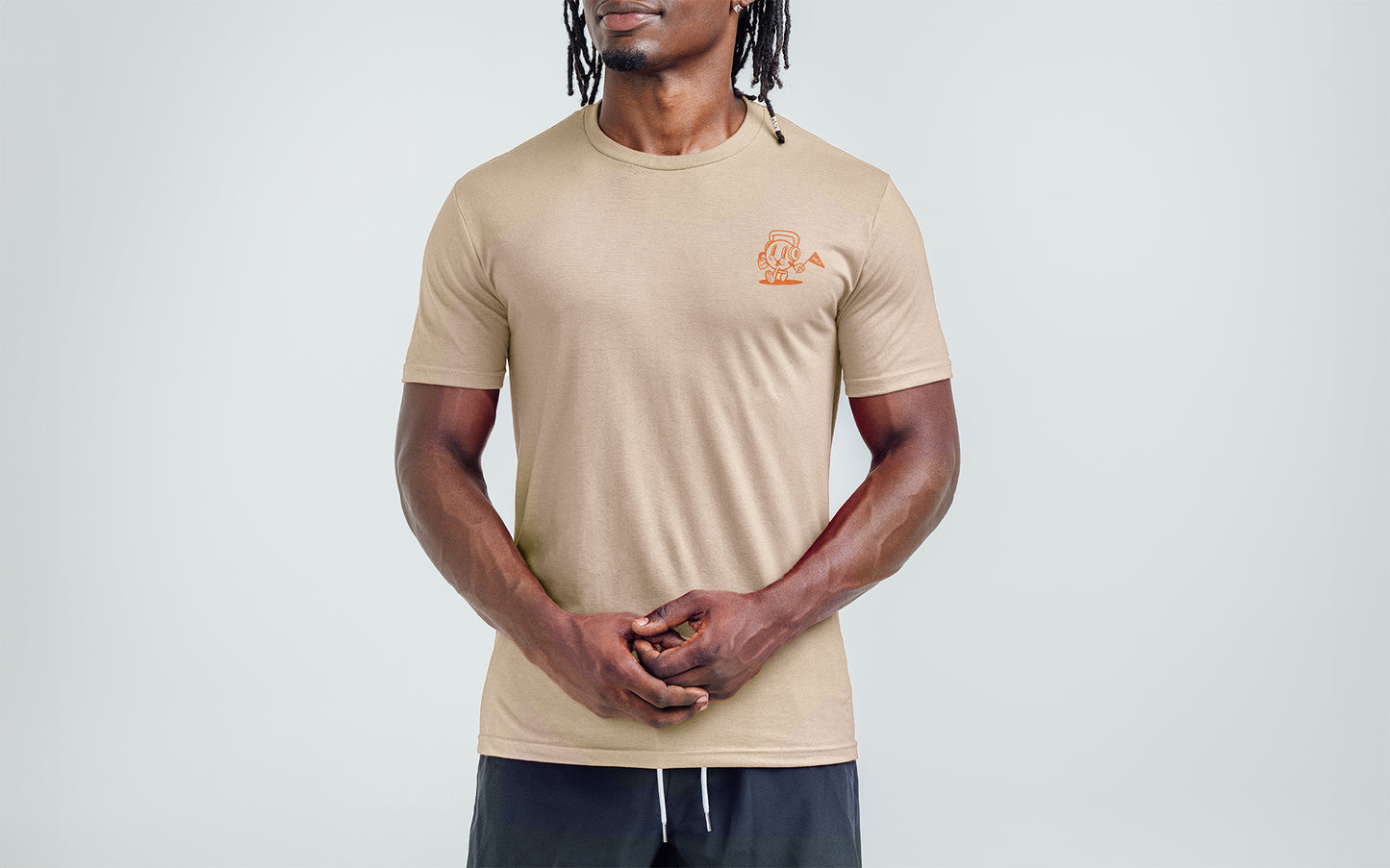 Athlete wearing the REP Fitness Men's Feeling Swell Tri-blend Crew T-Shirt in Heather Desert/Orange