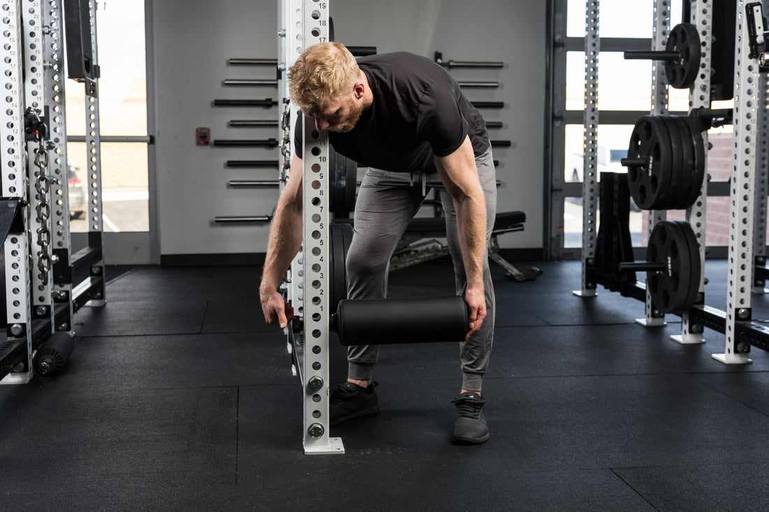 Athlete installing the Leg Roller 2.0