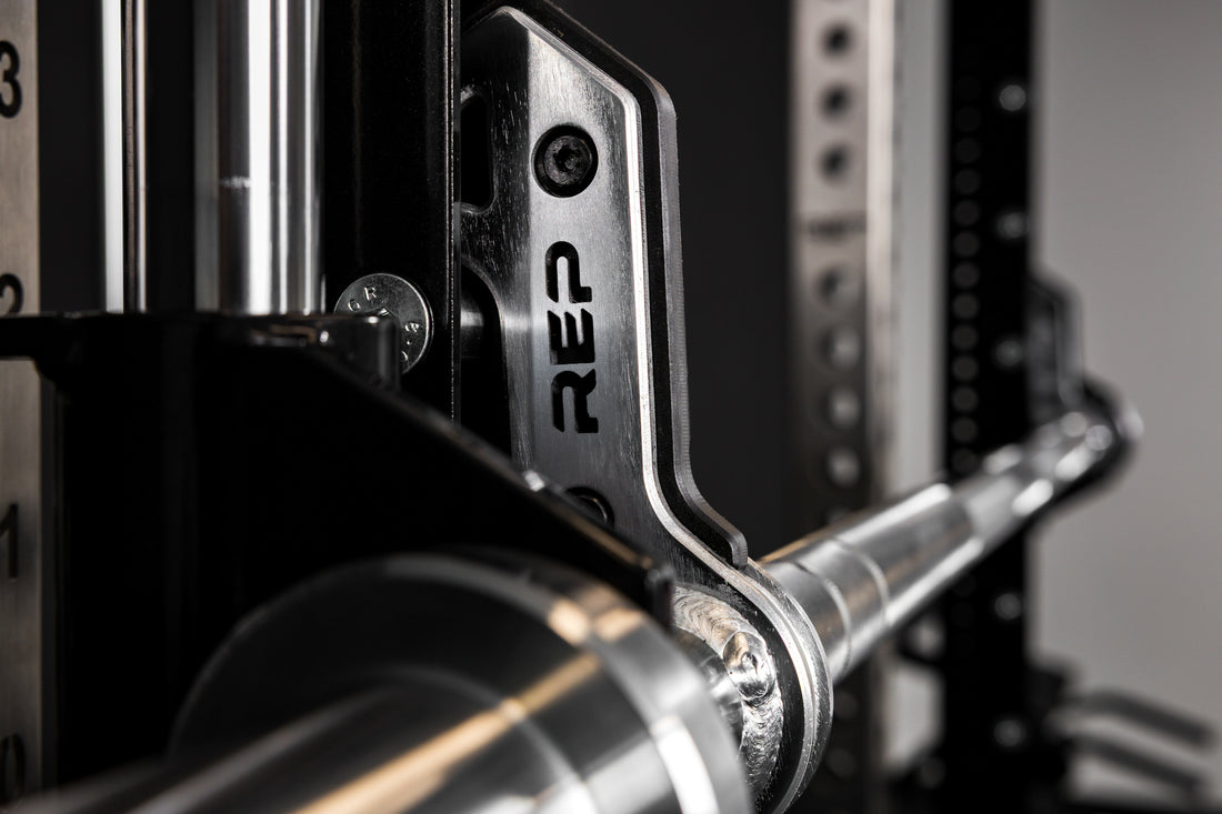 Close-up of the REP Fitness Smith Machine branding