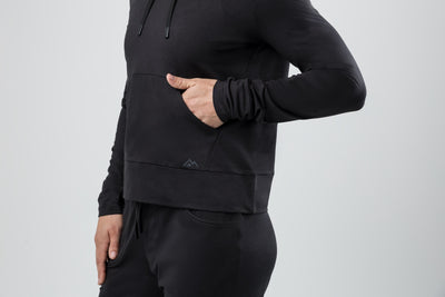 The REP Fitness Women's Vellus Hoodie in Heather Black front, pocket detail