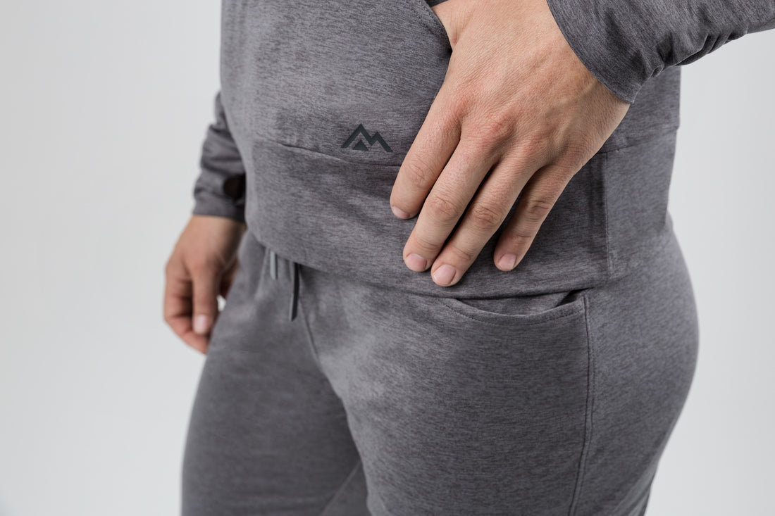 The REP Fitness Women's Vellus Hoodie in Heather Cool Gray front, pocket detail