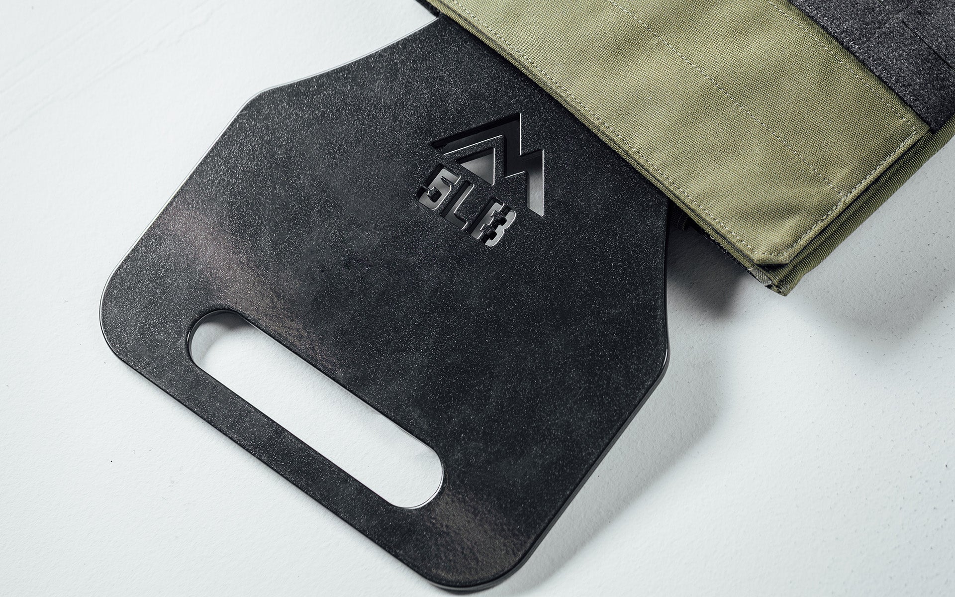 5lb Strata Weight Vest Plate going in to the Strata Weight Vest