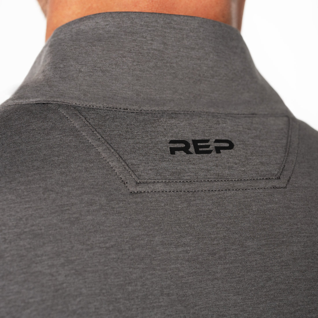 The REP Fitness Men's Apollo Half Zip in Heather Cool Gray collar detail