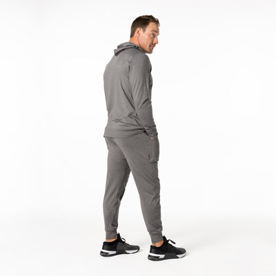 The REP Fitness Men's Apollo Hoodie in Heather Cool Gray back, looking over shoulder