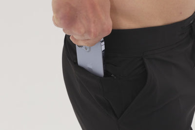 Athlete wearing the REP Fitness Men's Felix Pants 2.0 in Cool Gray, Black