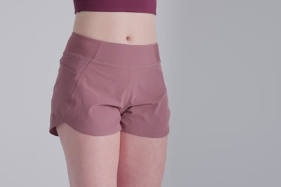 Athlete wearing the REP Fitness Women's Artemis Shorts in Mauve
