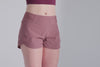 Athlete wearing the REP Fitness Women's Artemis Shorts in Mauve

