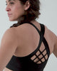 Athlete wearing the REP Fitness Women's Lattis Sports Bra in Aqua Gray, Black, Cocoa Powder