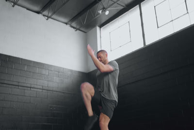 Athlete wearing the REP Fitness Men's Apollo Shorts in Heather Black/Cool Gray, Heather Cool Gray/Black, Heather Navy/Cool Gray