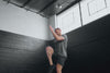 Athlete wearing the REP Fitness Men's Apollo Shorts in Heather Black/Cool Gray, Heather Cool Gray/Black, Heather Navy/Cool Gray