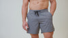 Athlete wearing the REP Fitness Men's Pinnacle Shorts in Dusty Blue