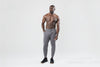 Athlete wearing the REP Fitness Men's Apollo Joggers in Heather Black, Heather Cool Gray, Heather Navy