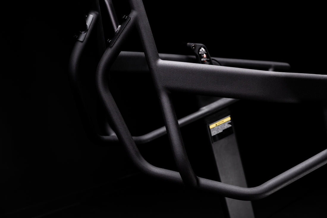 Close-up shot of the Strive Curved Treadmill handle bars 