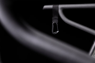 Close-up shot of the Curved Treadmill Straps on the Strive Curved Treadmill handlebars