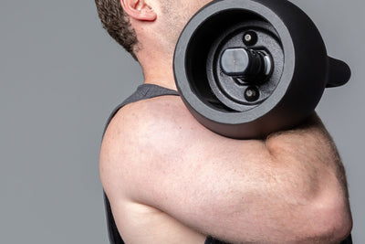 Exercising with the adjustable kettlebell