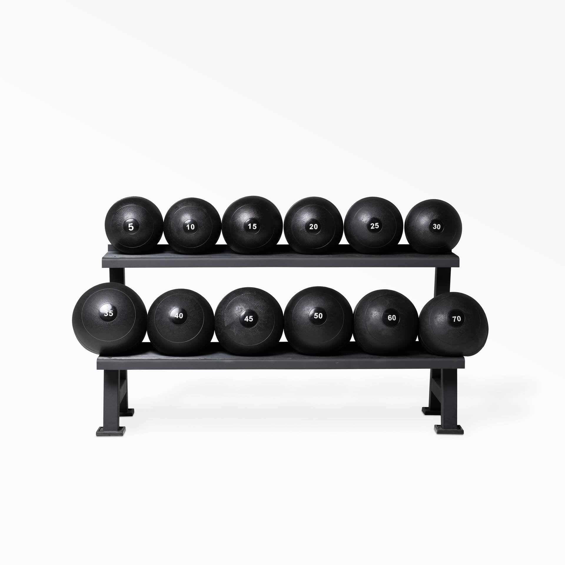 1 of each Slam Ball sizes on a rack