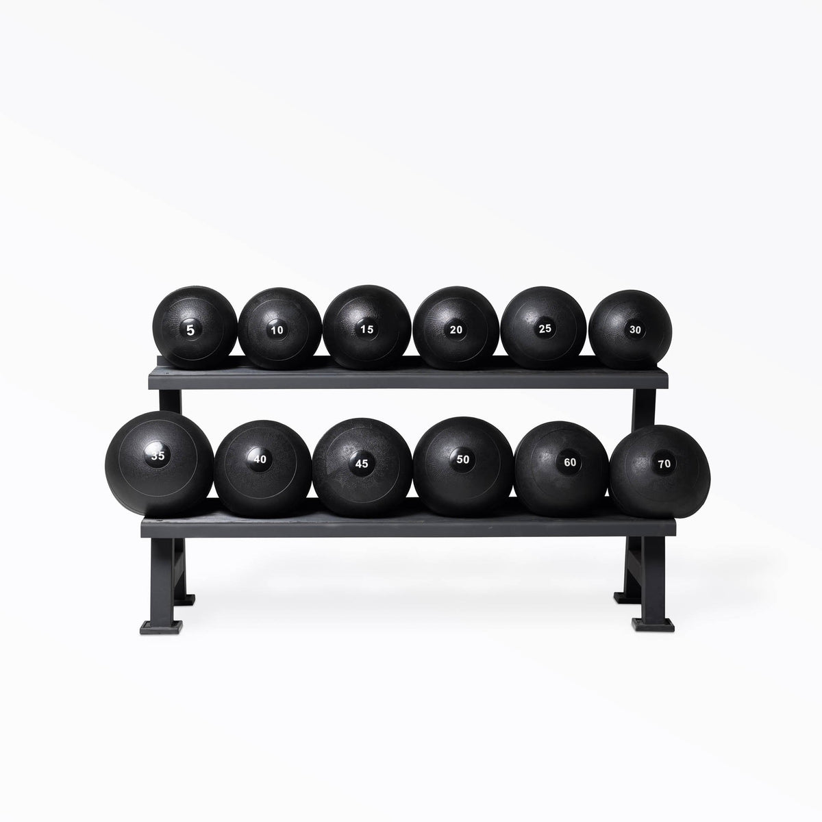 1 of each Slam Ball sizes on a rack