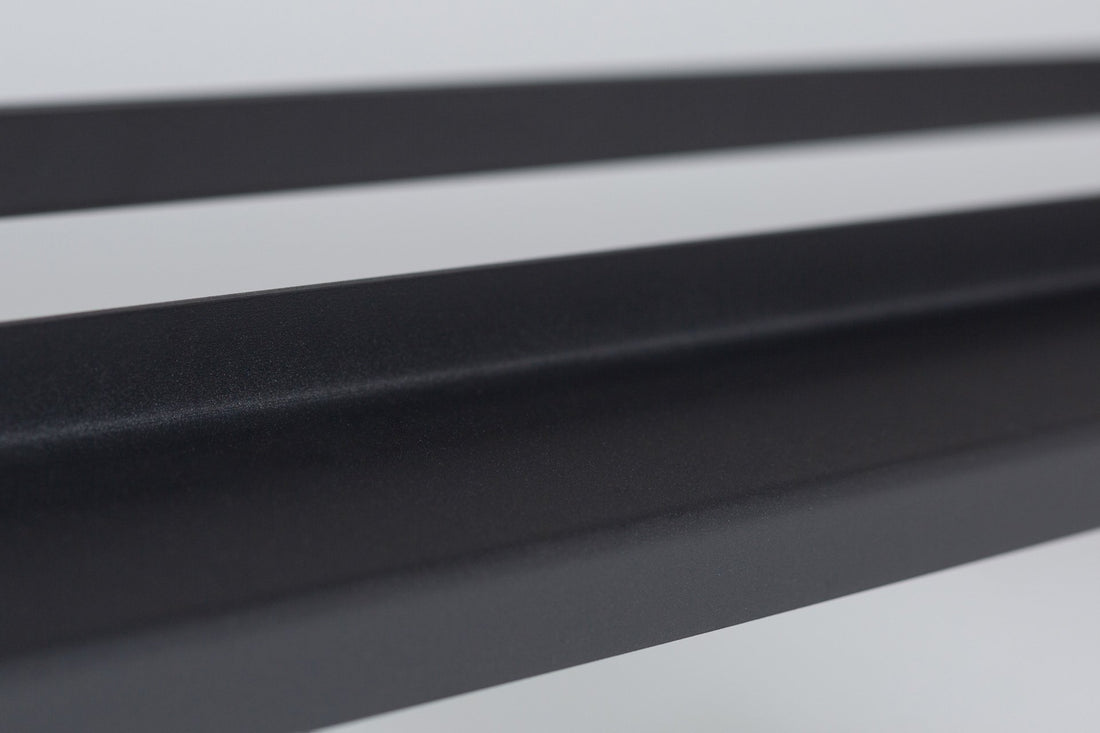 Close-up view of a REP Dumbbell Rack shelf.