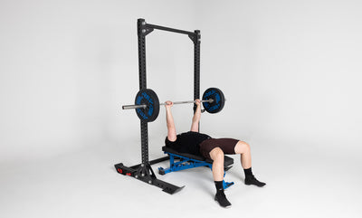 Oxylus Yoke With Pull-Up Bar Being Used For Bench Press